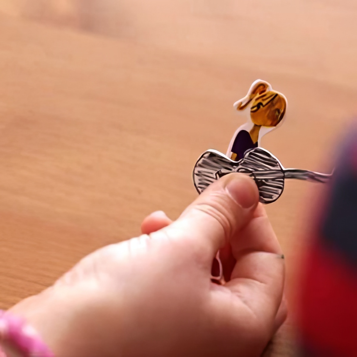 Make this mini paper dolls together with your kids and have fun playing indoors!