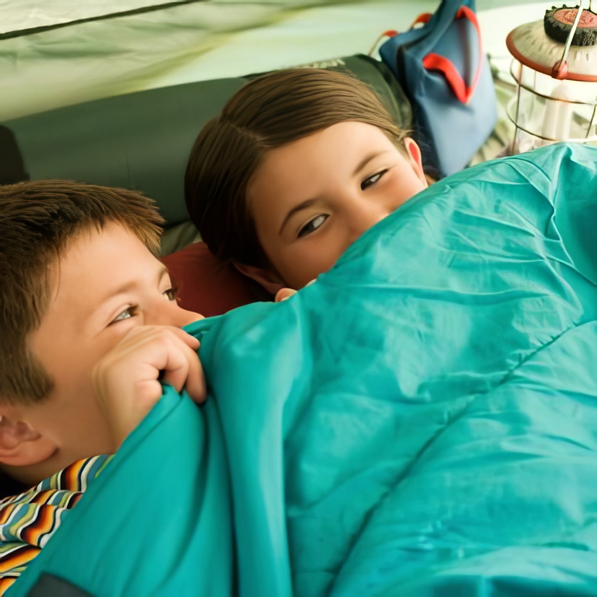 Set the tent indoors for a fun staycation camping trip this weekend with your kids!