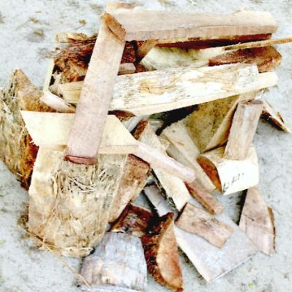 stack of firewood to use for sculpture building as outdoor games to burn off steam