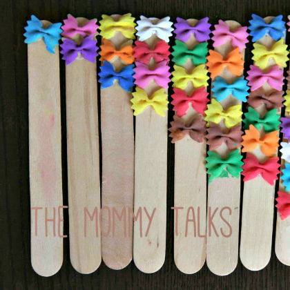 pasta counting sticks - mommy talks image showing colorful bow tie pasta in counting sticks for your toddlers