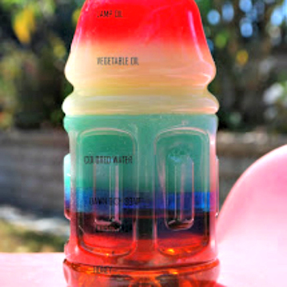 layered density. Colorful Layered Discovery Bottle. Sensory Bottle.
