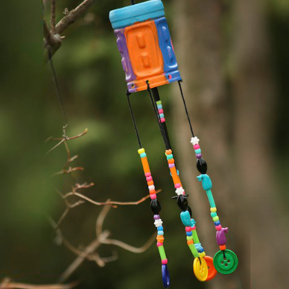 Create this beautiful and colorful plastic bottle wind chimes kids will love! 