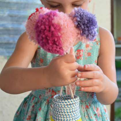 Flower Pom Pom Craft For Kids. Flower Pom Pom In a Vase with three colors- dark pink, light pink and violet