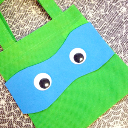 party bag, 25 Totally Tubular Ninja Turtle Crafts and Snacks Featured, cartoon-inspired crafts, cartoons, ninja turtles, fun crafts for kids