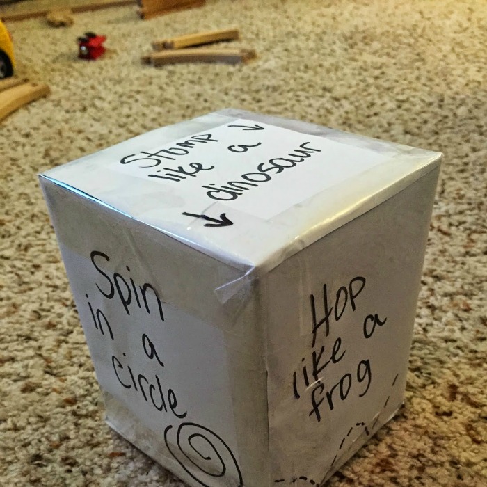 Energy Dice Cube made of tissue box, white paper, scissors, markers and tape. for a silly slumber party.