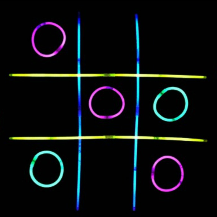 DIY Glow-in-the-dark Tic Tac Toe made of glow sticks for slumber party